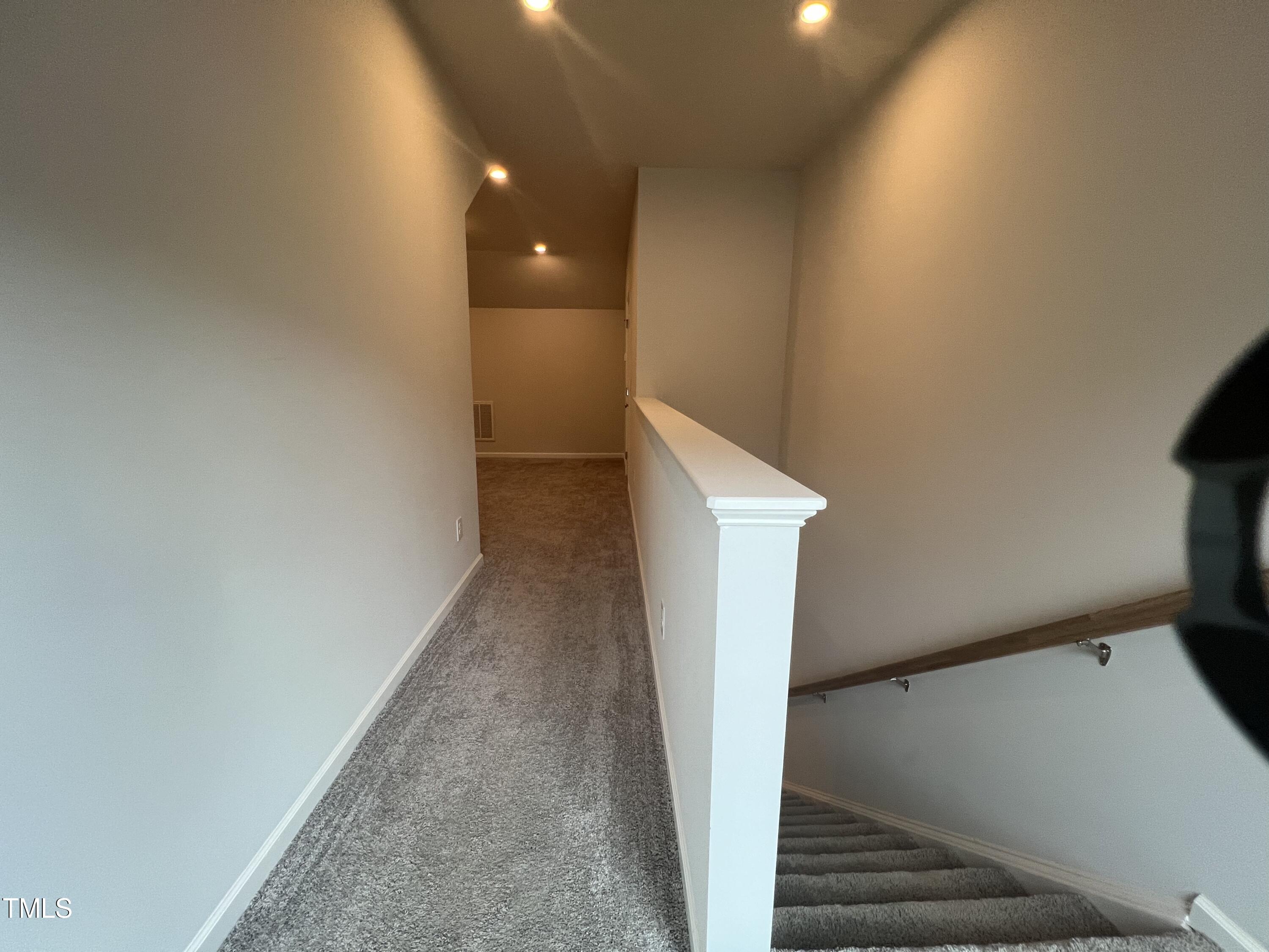 117 Clear Water Road Louisburg, NC 27549 - Photo 27 of 34 a view of a hallway with staircase