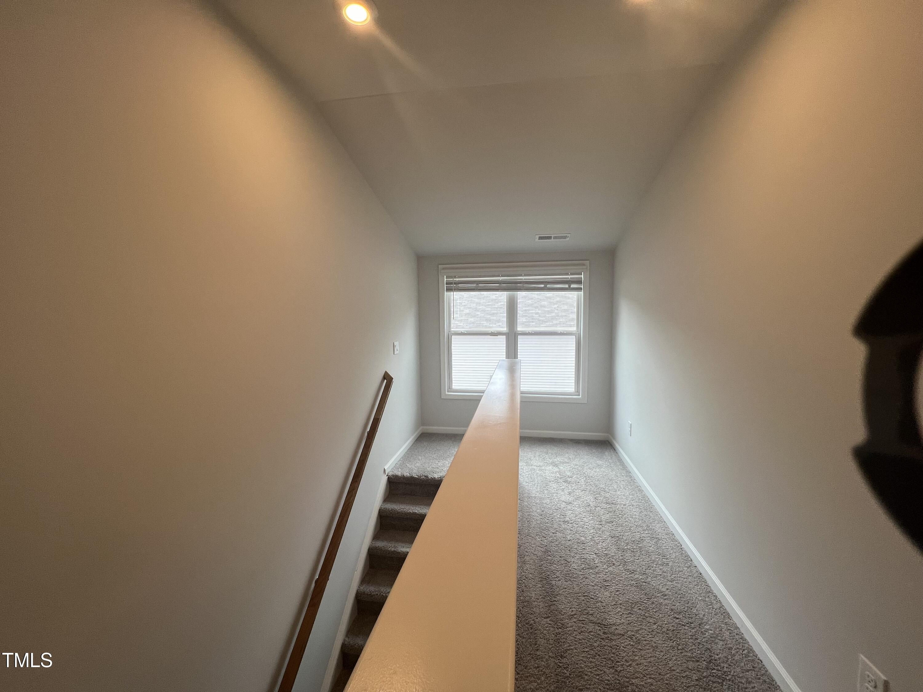 117 Clear Water Road Louisburg, NC 27549 - Photo 28 of 34 wooden floor in an empty room with a window