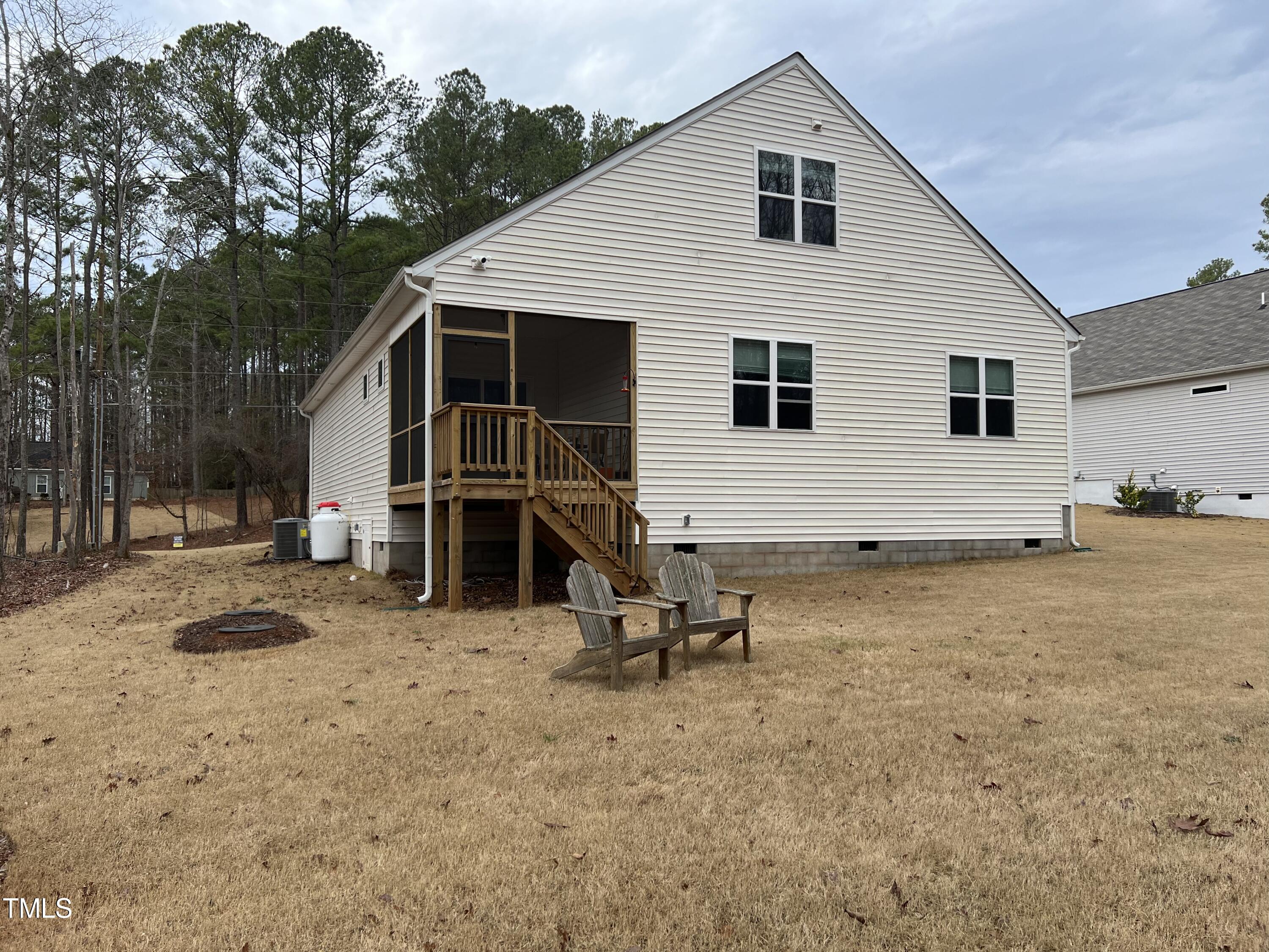 117 Clear Water Road Louisburg, NC 27549 - Photo 5 of 34 a view of backyard of house