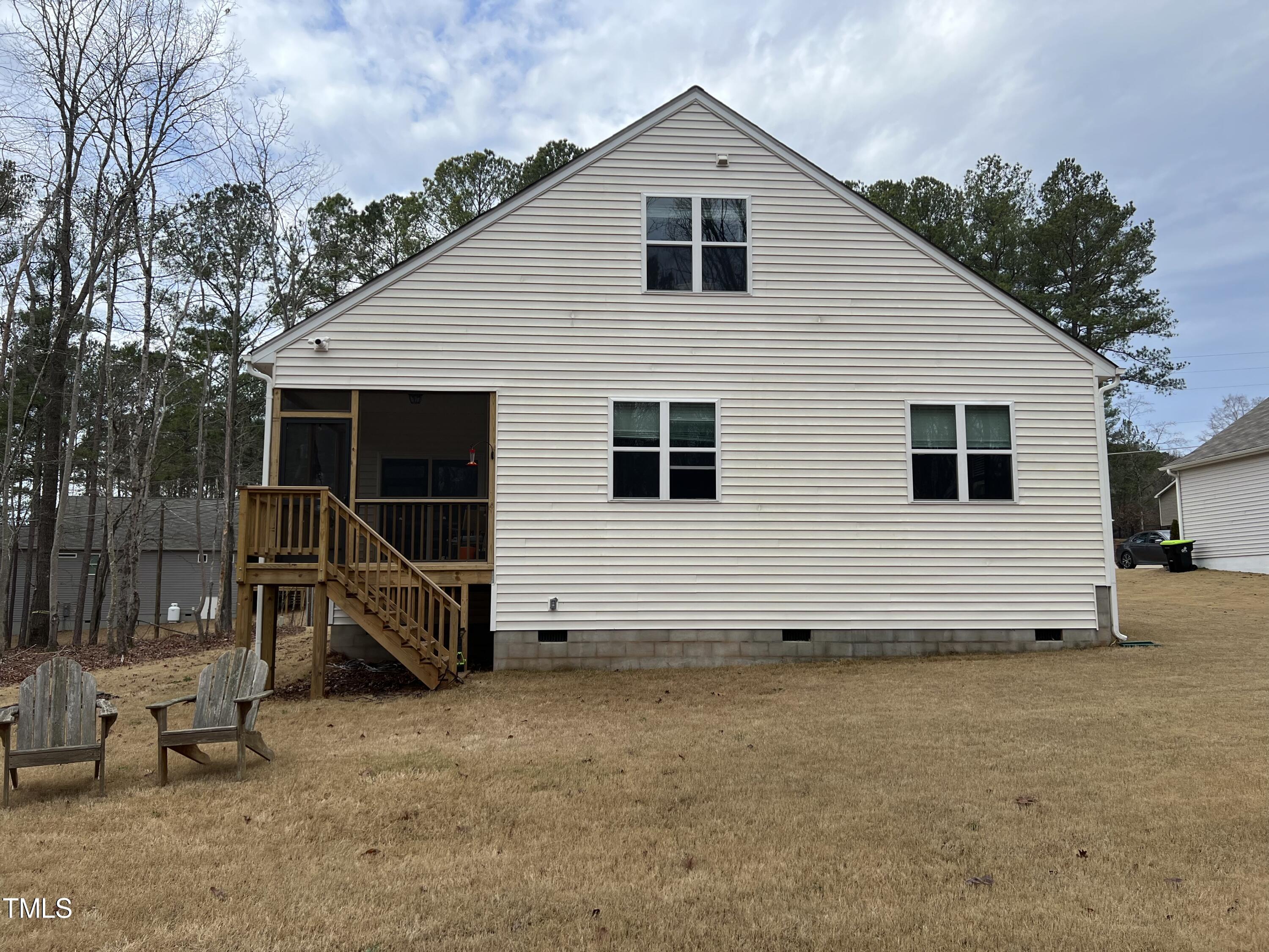 117 Clear Water Road Louisburg, NC 27549 - Photo 6 of 34 a view of a house with backyard