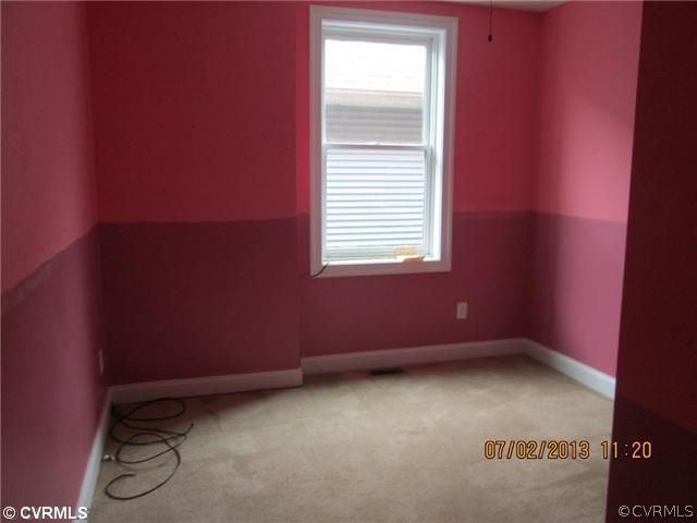 1417 Decatur Street Richmond, VA 23224 - Photo 8 of 8 a view of an empty room and a window