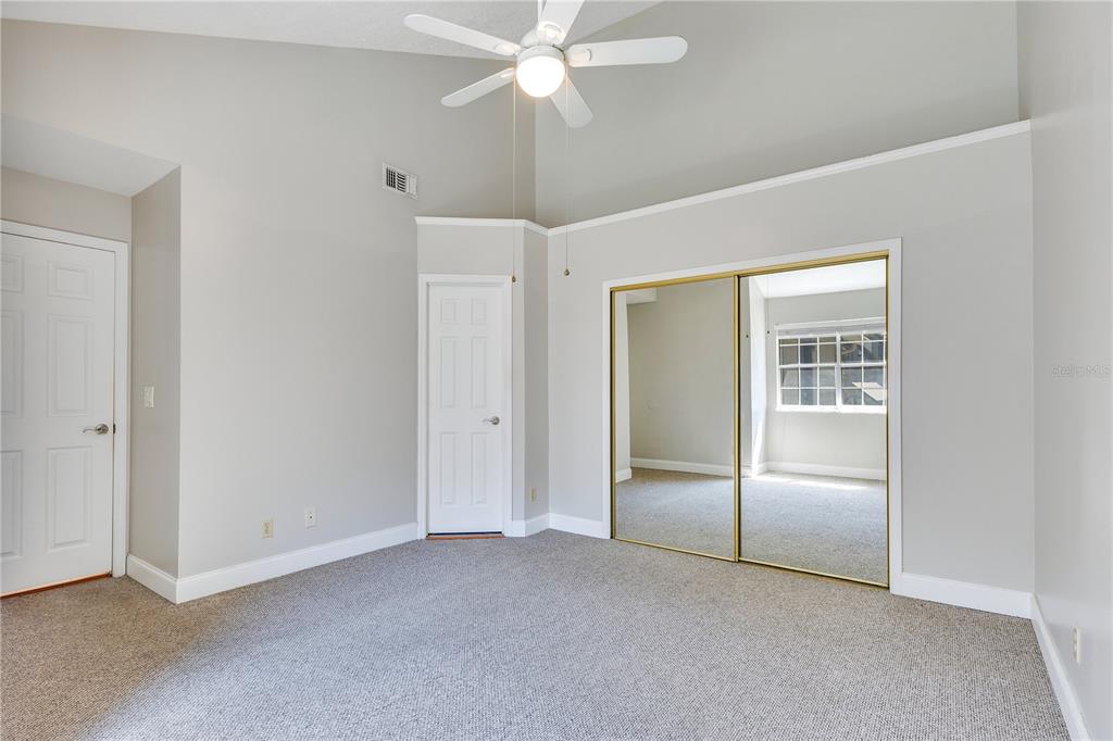 955 Forest Ridge Court, Unit 203 Lake Mary, FL 32746 - Photo 16 of 26 a view of an empty room with a window