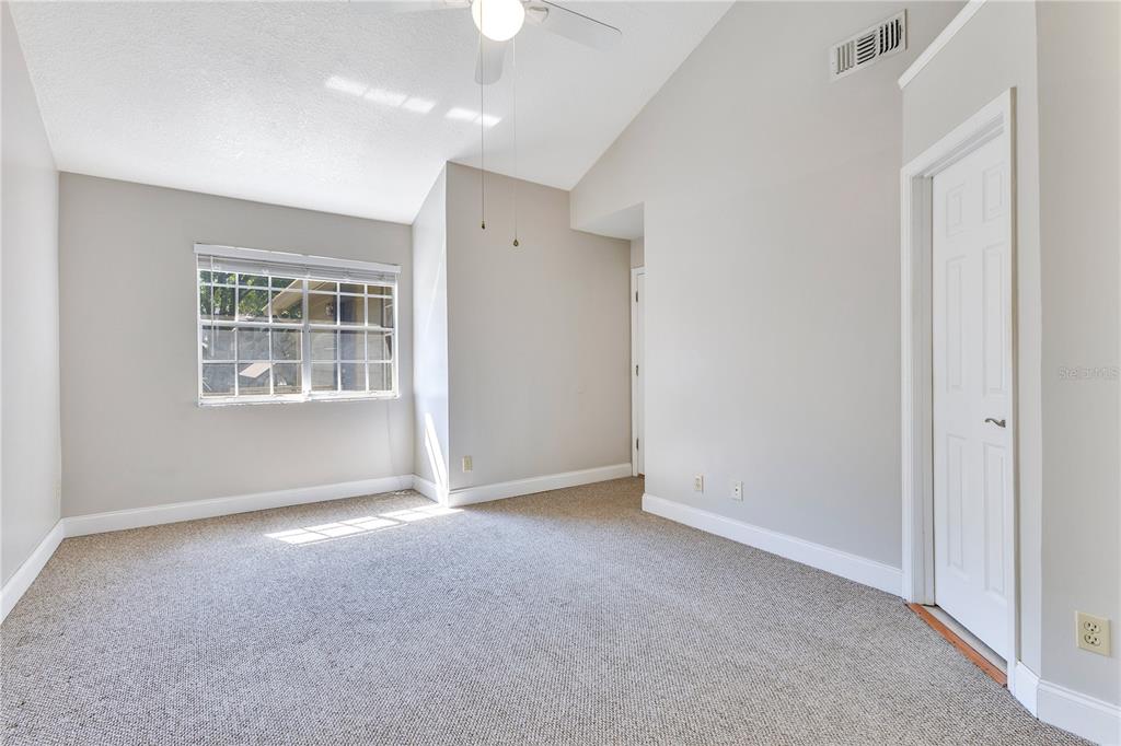 955 Forest Ridge Court, Unit 203 Lake Mary, FL 32746 - Photo 20 of 26 an empty room with windows