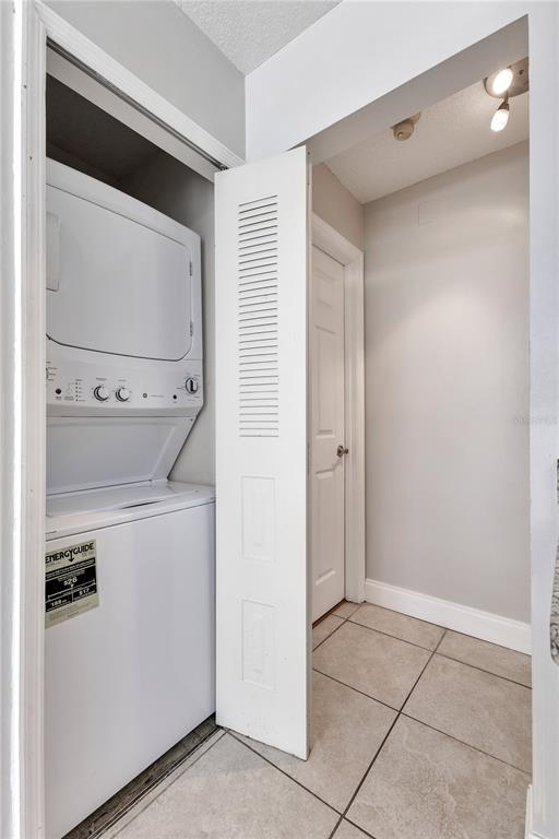 955 Forest Ridge Court, Unit 203 Lake Mary, FL 32746 - Photo 21 of 26 a view of storage and utility room with washer and dryer