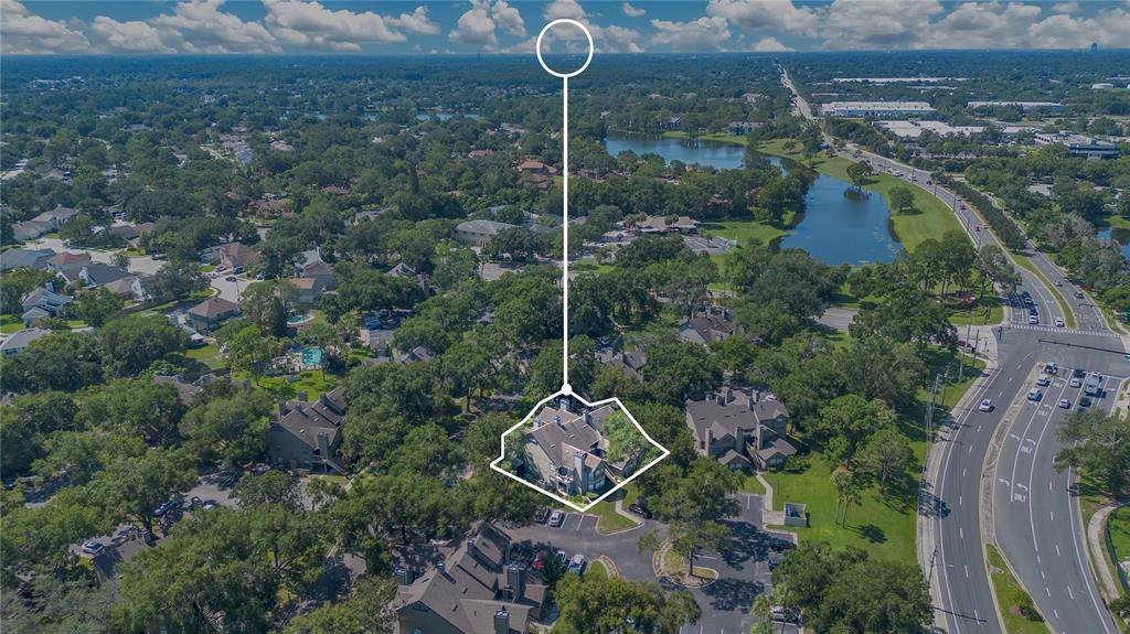 955 Forest Ridge Court, Unit 203 Lake Mary, FL 32746 - Photo 25 of 26 an aerial view of a house