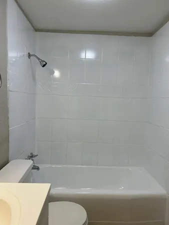 a bathroom with a sink and a bathtub