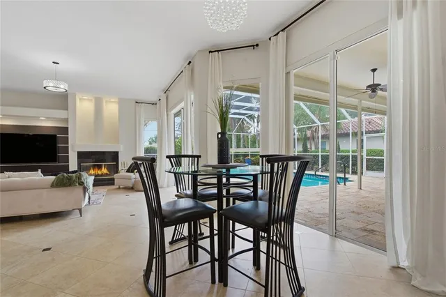 a kitchen with stainless steel appliances granite countertop a refrigerator and a stove