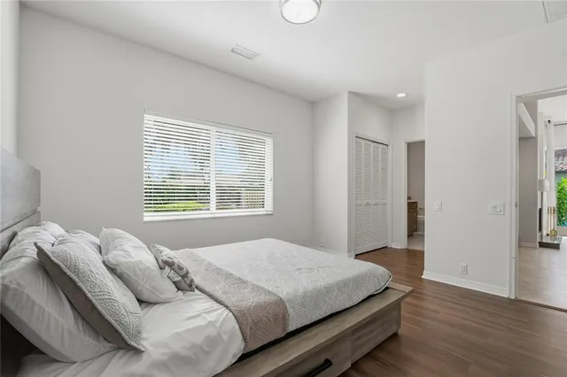 a view of a table and chairs in the garden