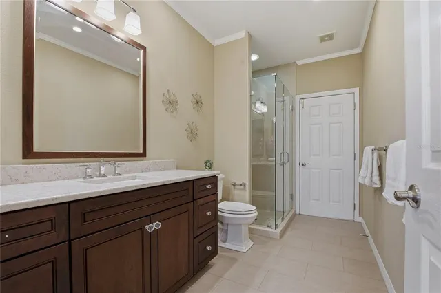 an aerial view of multiple houses with yard