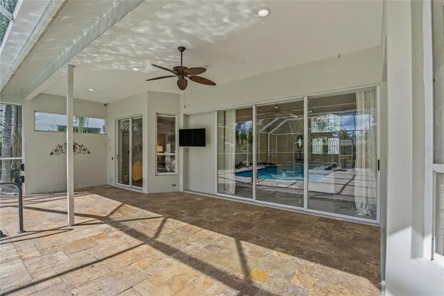 an aerial view of residential house with outdoor space and lake view