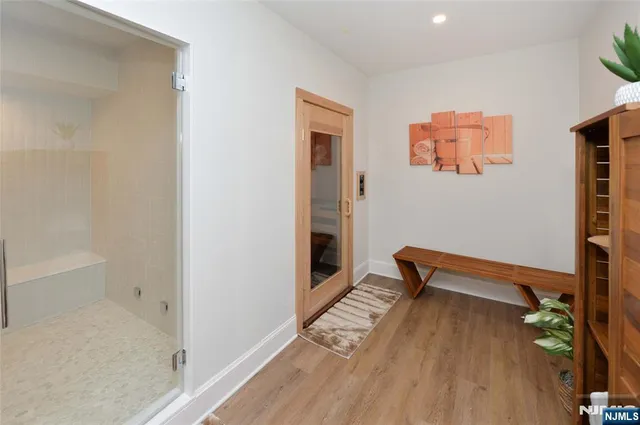 a bathroom with a sink and curtain