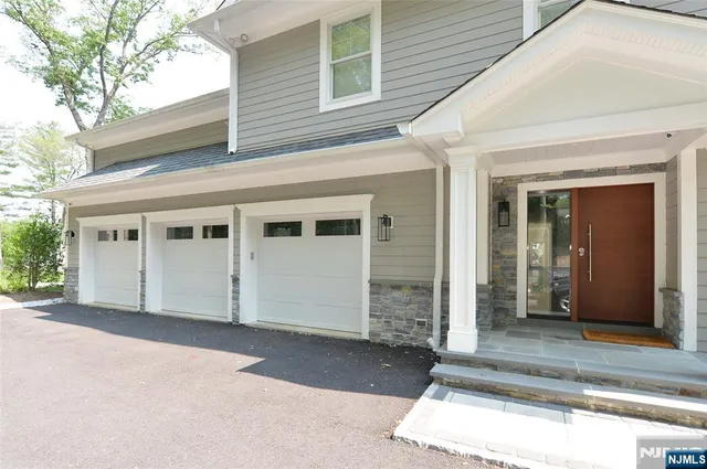 a view of a house with a big yard