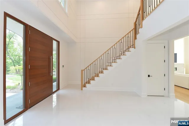 a view of an entryway with staircase