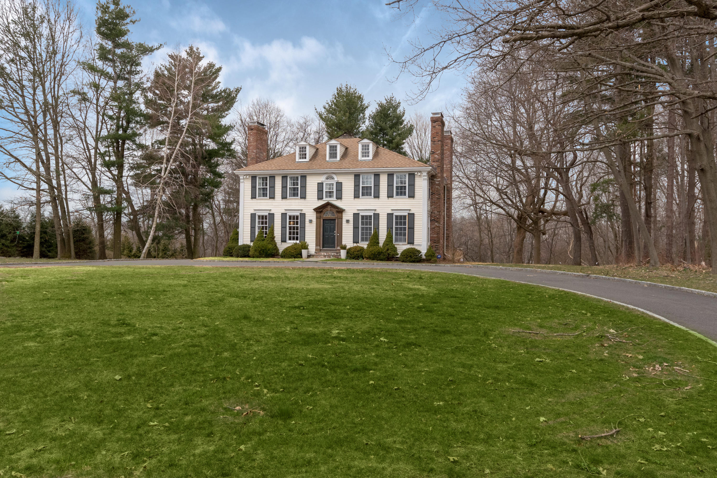 a view of a house with a big yard