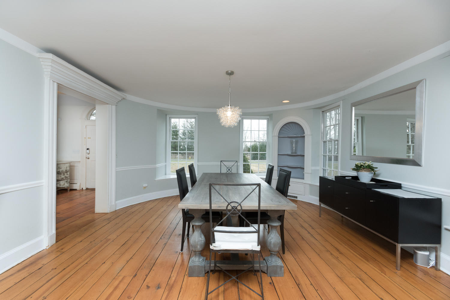 108 Long Neck Point Road Darien, CT 06820 - Photo 11 of 39 a view of a dining room with furniture and wooden floor