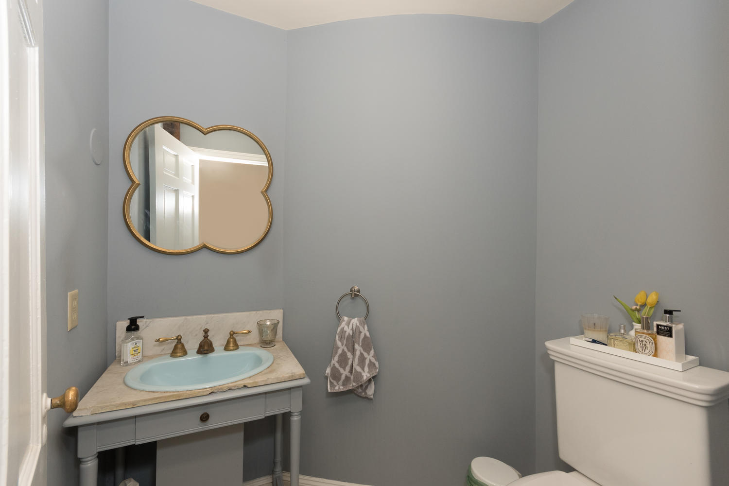 108 Long Neck Point Road Darien, CT 06820 - Photo 18 of 39 a bathroom with a sink and a mirror