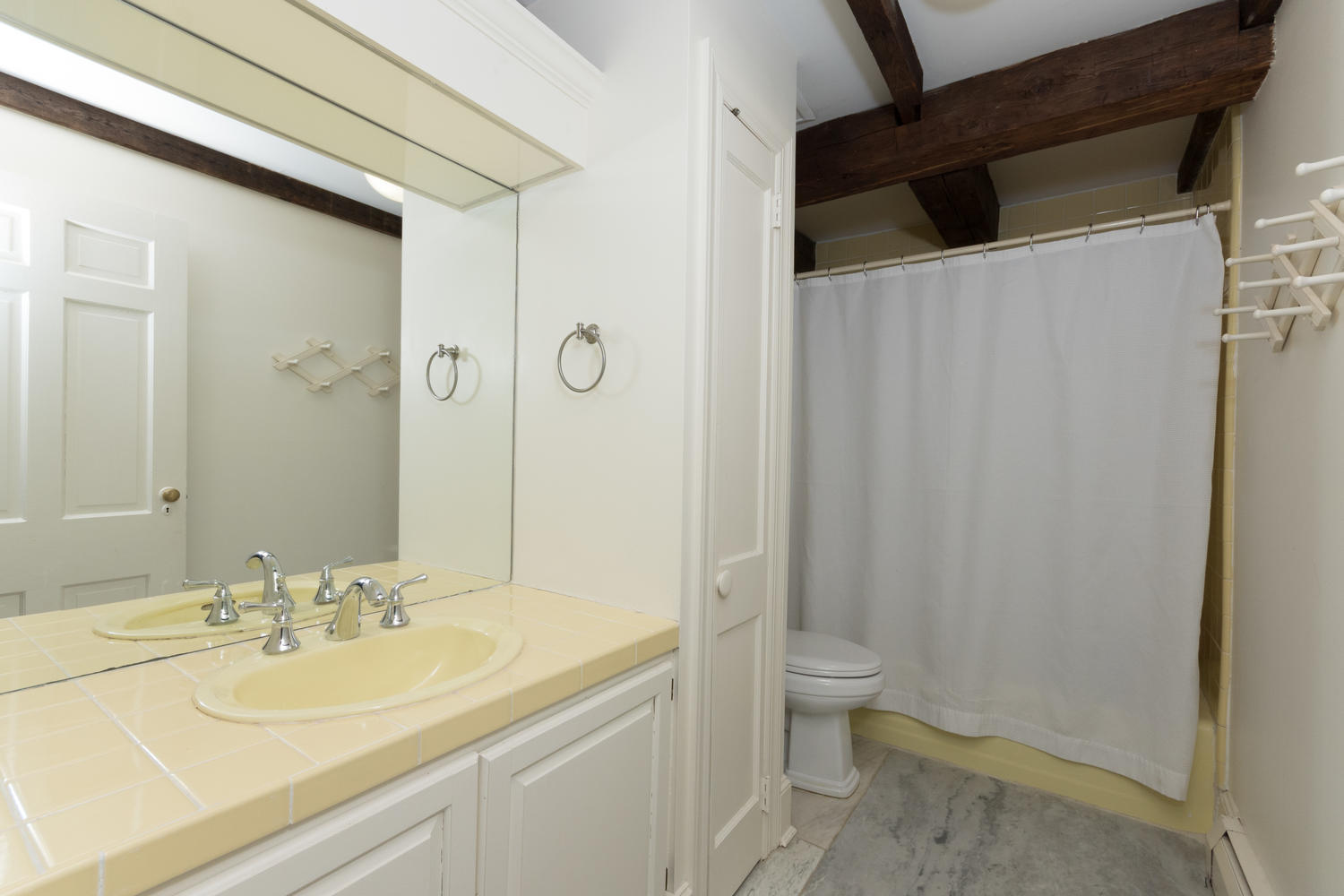 108 Long Neck Point Road Darien, CT 06820 - Photo 26 of 39 a bathroom with a sink a toilet and shower