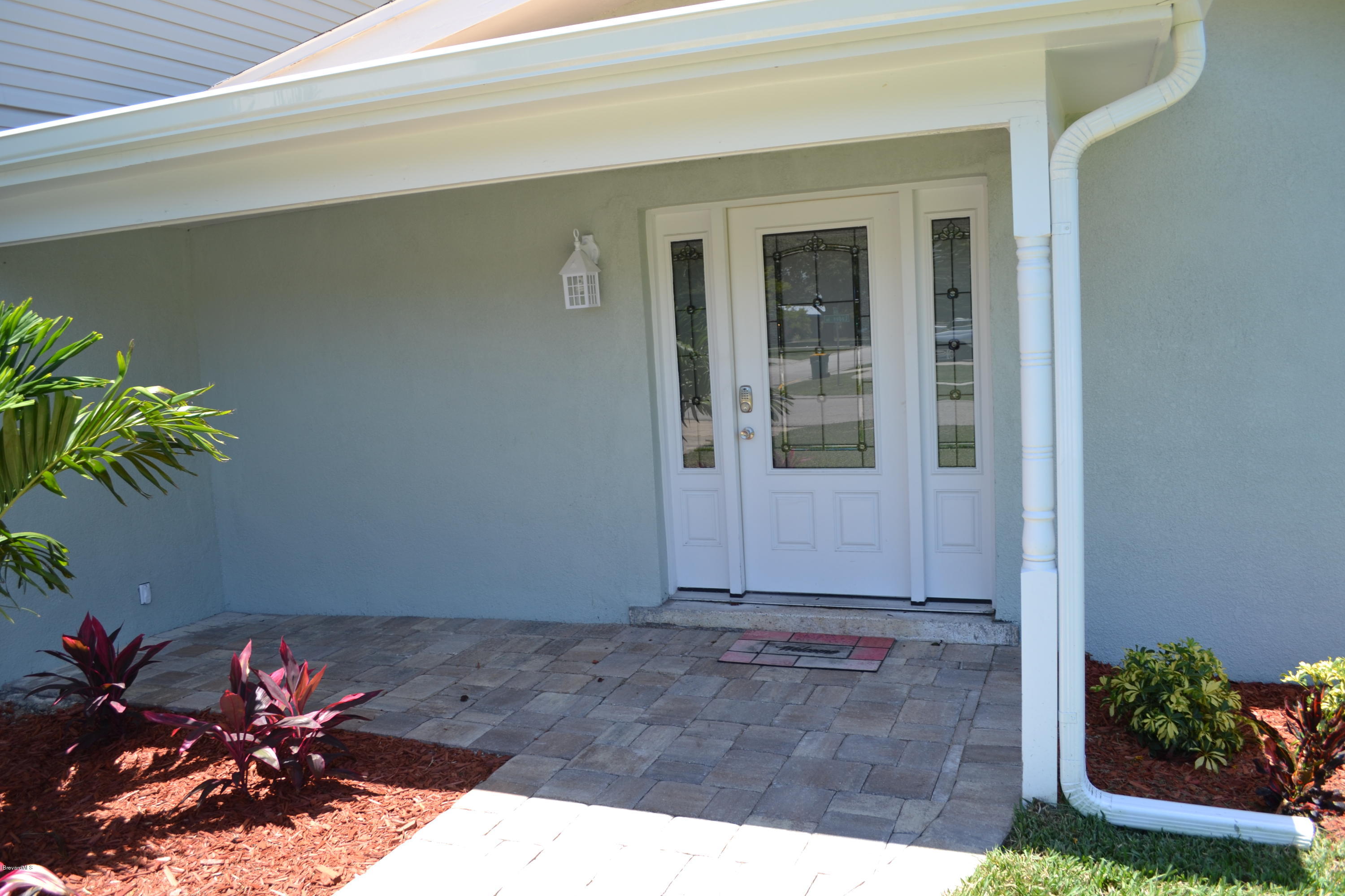 2272 Laden Road Melbourne, FL 32935 - Photo 4 of 39 Covered Front Porch