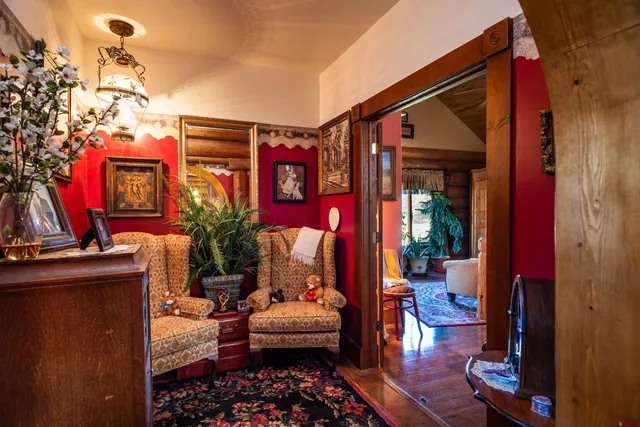 a outdoor living space with furniture and a fireplace