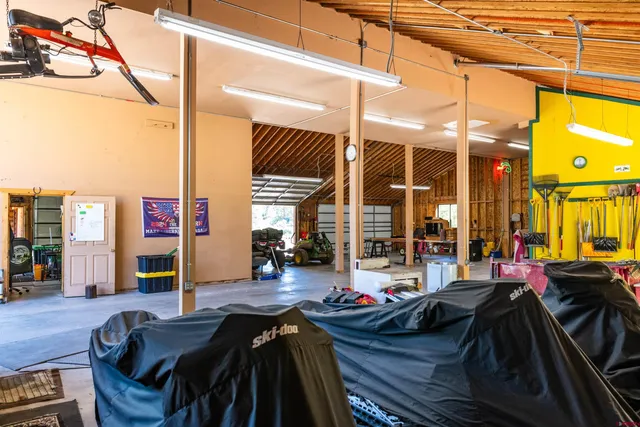a view of a livingroom with furniture and window