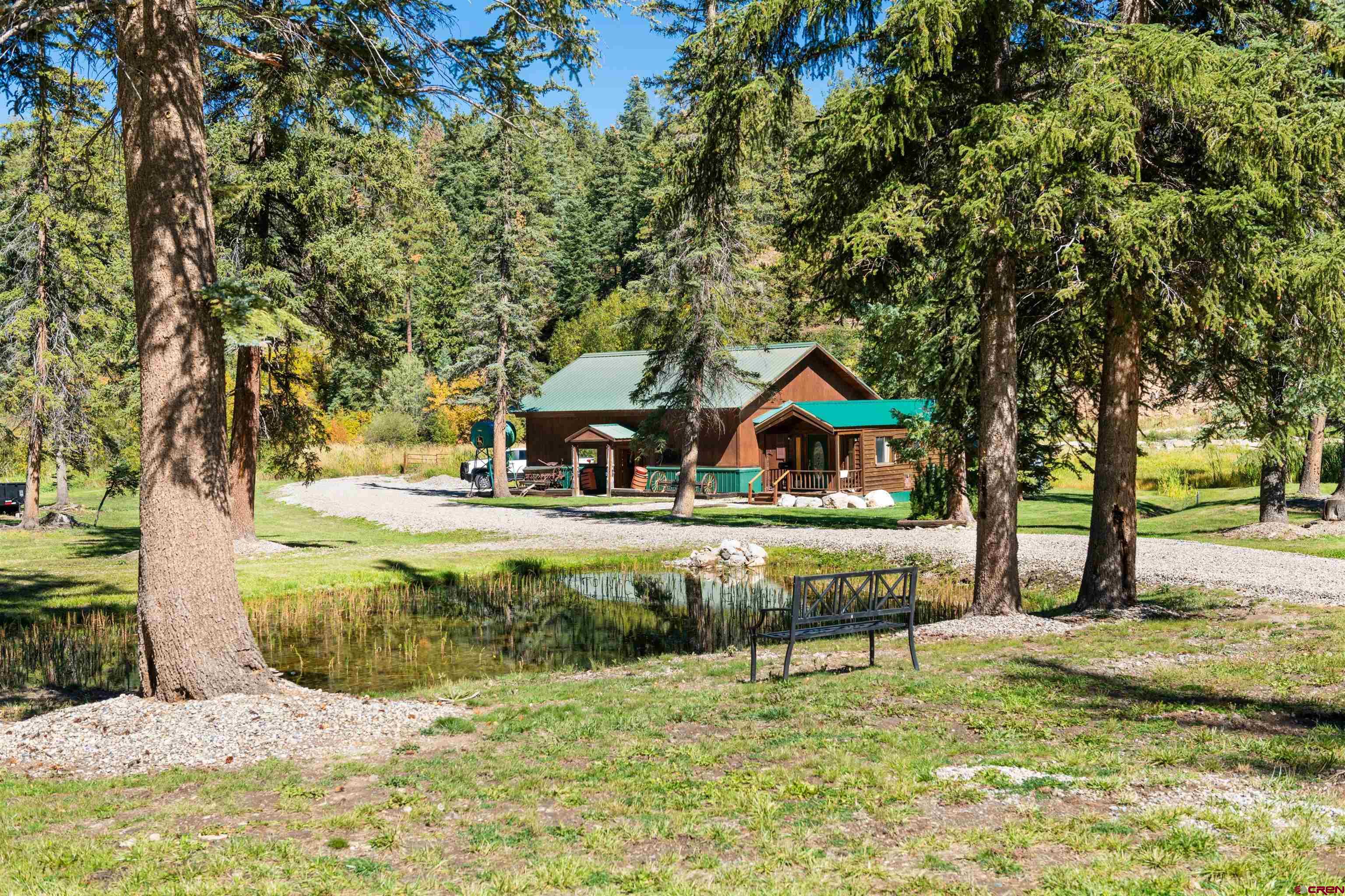 42574 Highway 550 Durango, CO 81301 - Photo 23 of 24 a swimming pool with trees in the background