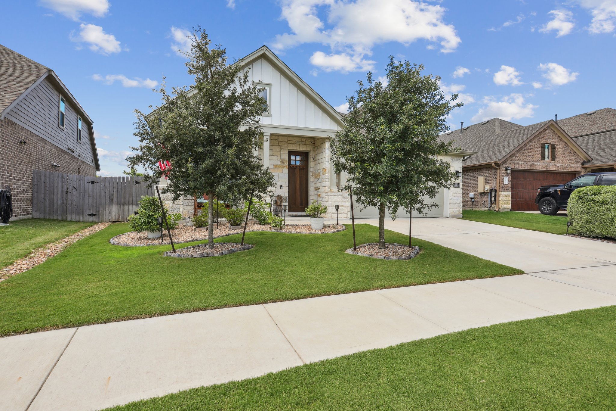 1102 Simmental Loop Hutto, TX 78634 - Photo 2 of 29 a view of a house with a yard