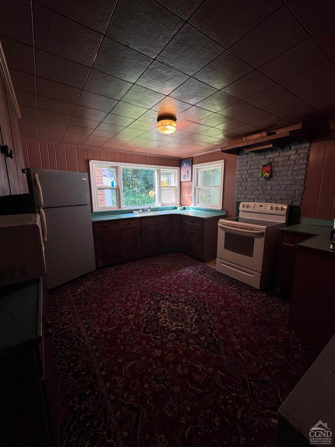41 Dalton Road Cairo, NY 12413 - Photo 4 of 12 a kitchen with kitchen island granite countertop a stove and a refrigerator