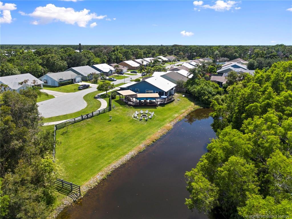 4401 Southeast Satinleaf Place Stuart, FL 34997 - Photo 44 of 51 Ariel of Home, Lake, and Lot