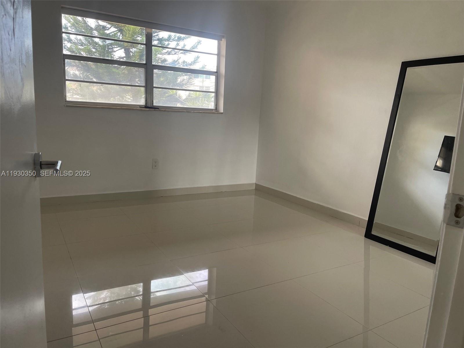 1670 Northeast 191st Street, Unit 2133 Miami, FL 33179 - Photo 13 of 15 a view of rack