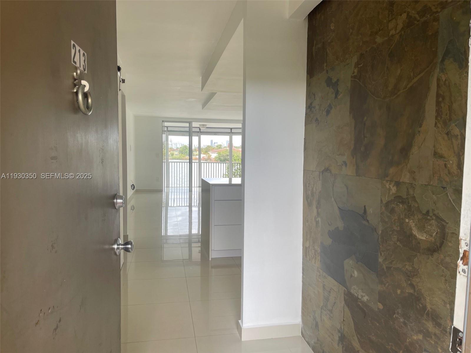 1670 Northeast 191st Street, Unit 2133 Miami, FL 33179 - Photo 5 of 15 a bathroom with a shower