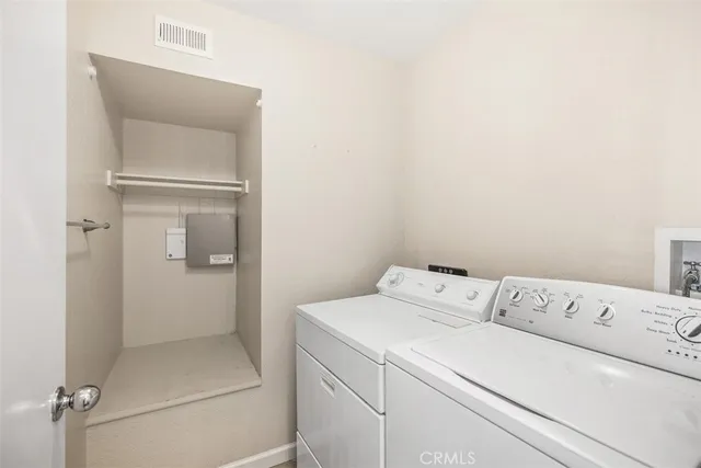 a bathroom with a sink vanity and mirror