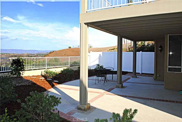 a view of swimming pool with seating space