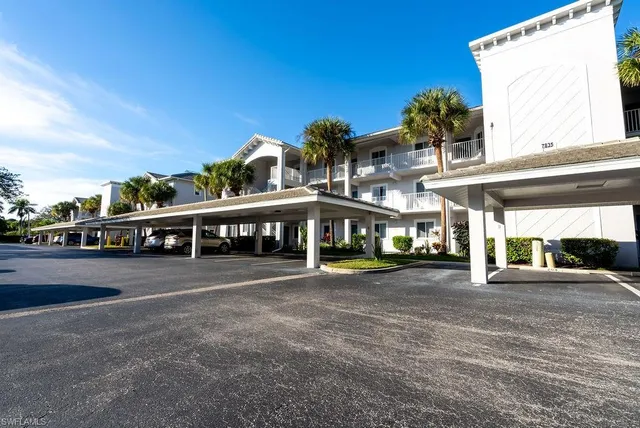 a view of a street with cars