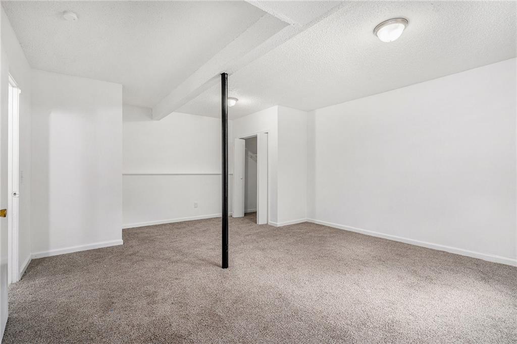 5444 Wylstream Way Norcross, GA 30093 - Photo 9 of 12 a view of an empty room