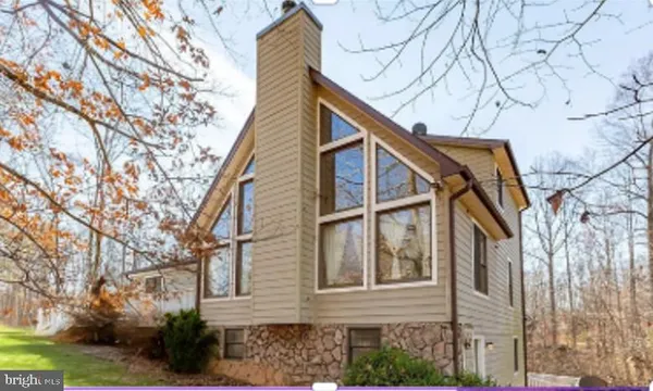a view of a house with a snow