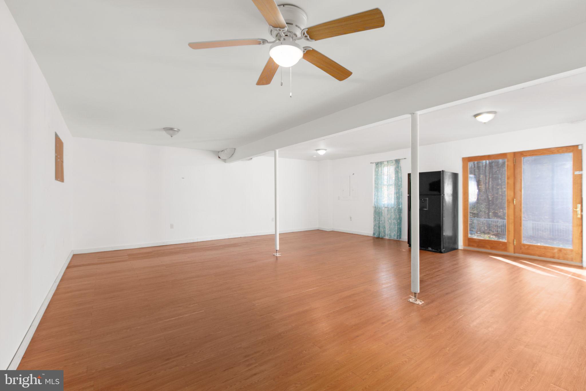 7312 Sugar Hollow Road Orange, VA 22960 - Photo 31 of 47 a view of an empty room with a ceiling fan