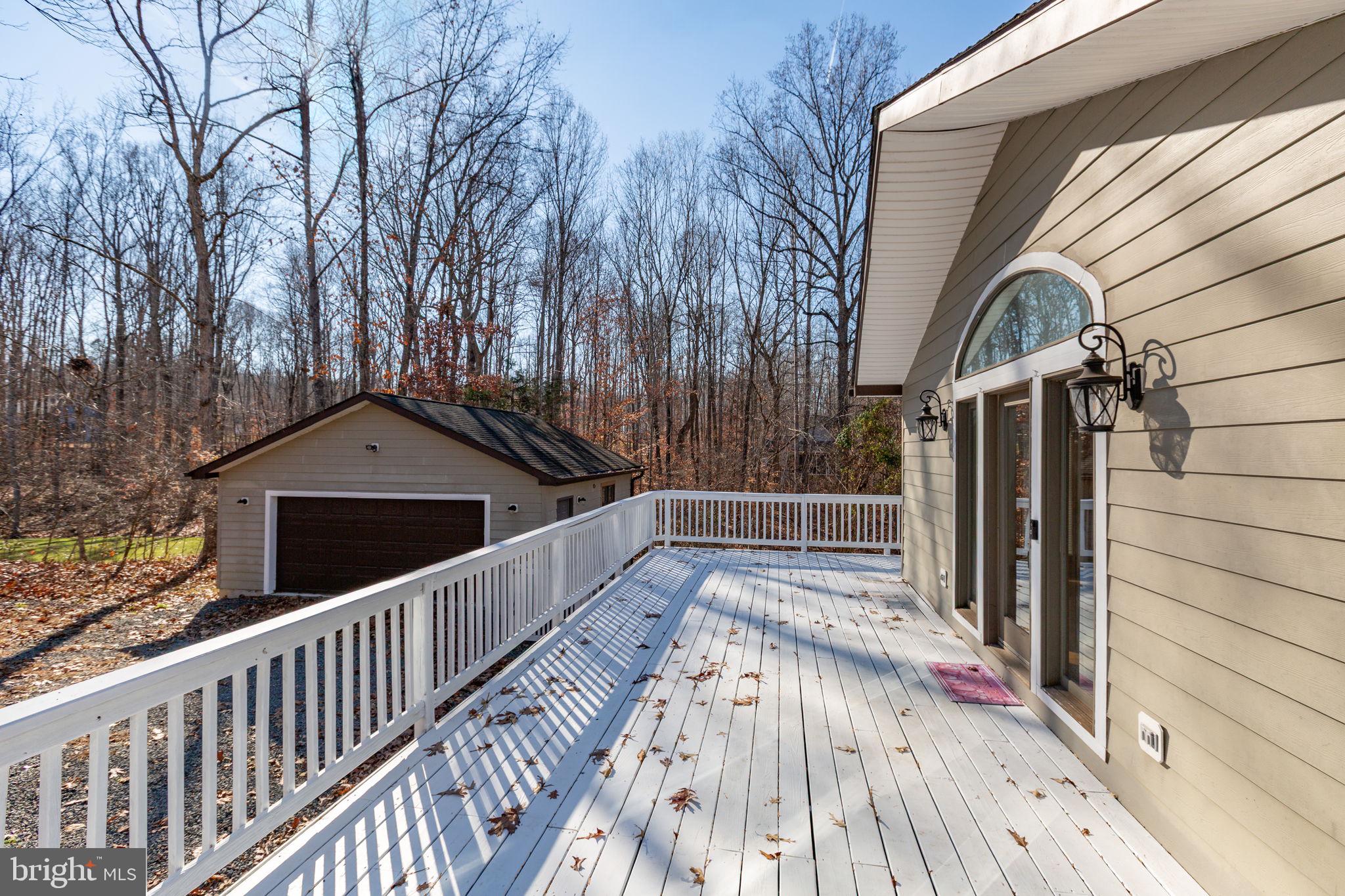 7312 Sugar Hollow Road Orange, VA 22960 - Photo 40 of 47 a view of balcony with wooden floor and fence
