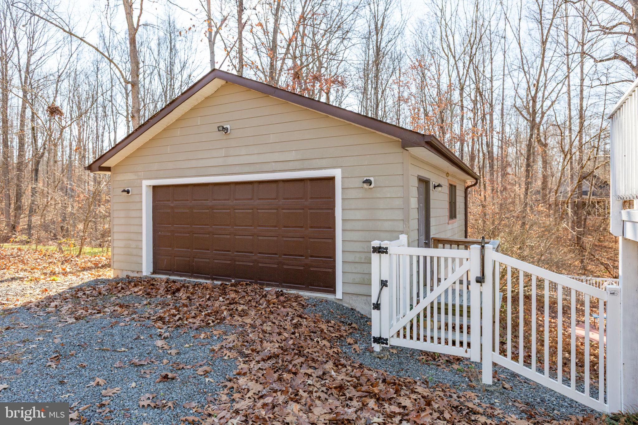 7312 Sugar Hollow Road Orange, VA 22960 - Photo 42 of 47 a front view of a house with a yard