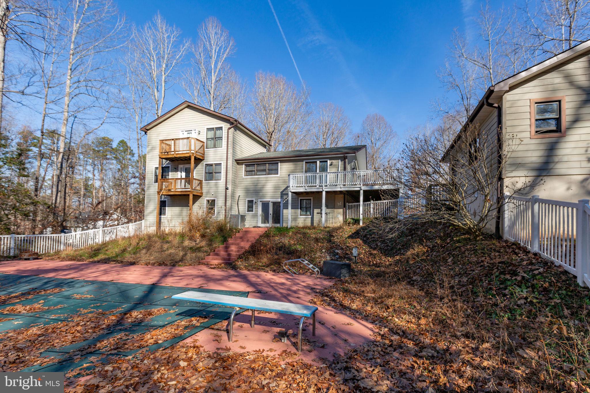 7312 Sugar Hollow Road Orange, VA 22960 - Photo 45 of 47 a backyard of a house with yard and outdoor seating