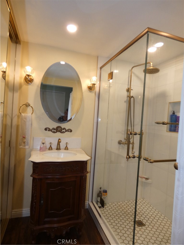 334 West Santa Elena Road Palm Springs, CA 92262 - Photo 11 of 45 a bathroom with a sink and a mirror