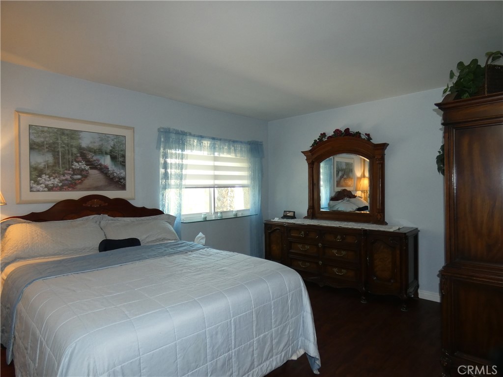 334 West Santa Elena Road Palm Springs, CA 92262 - Photo 15 of 45 a bedroom with a bed and a window