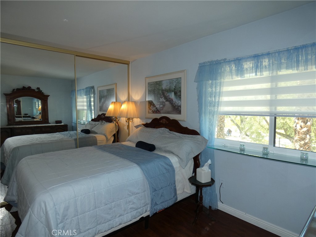 334 West Santa Elena Road Palm Springs, CA 92262 - Photo 16 of 45 a bedroom with a bed and window