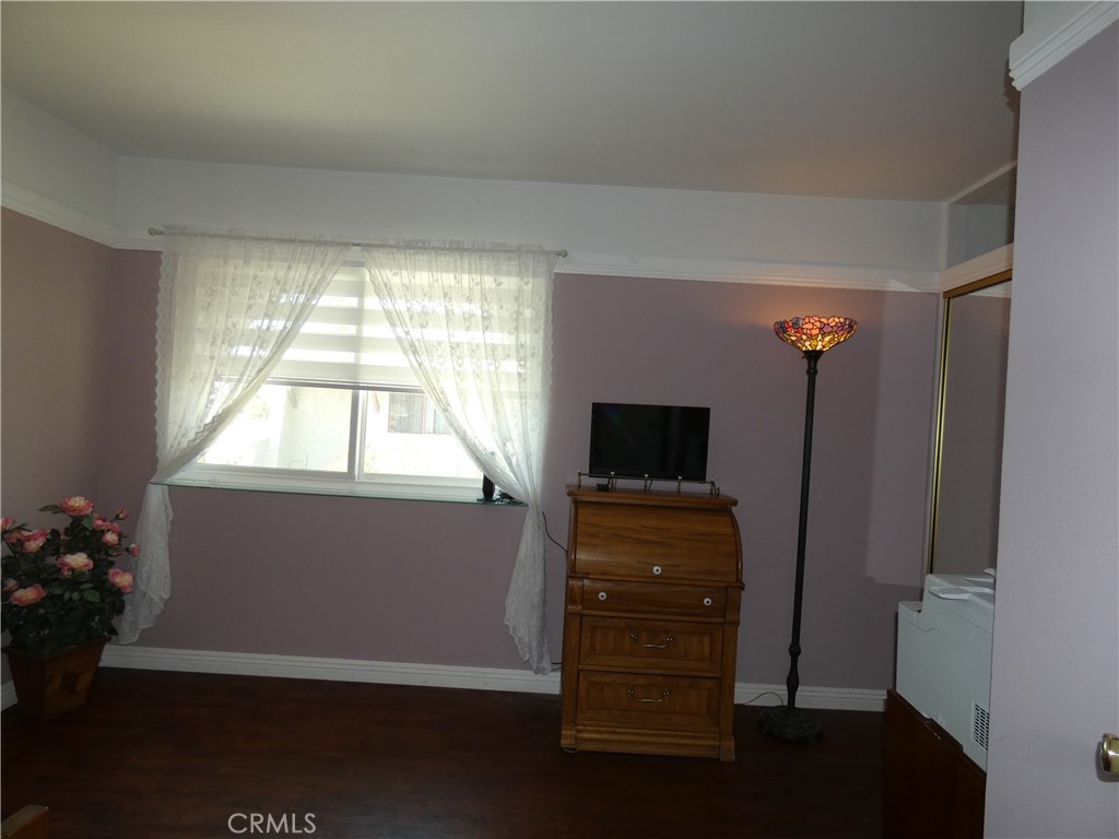 334 West Santa Elena Road Palm Springs, CA 92262 - Photo 17 of 45 a room with furniture and flat screen tv