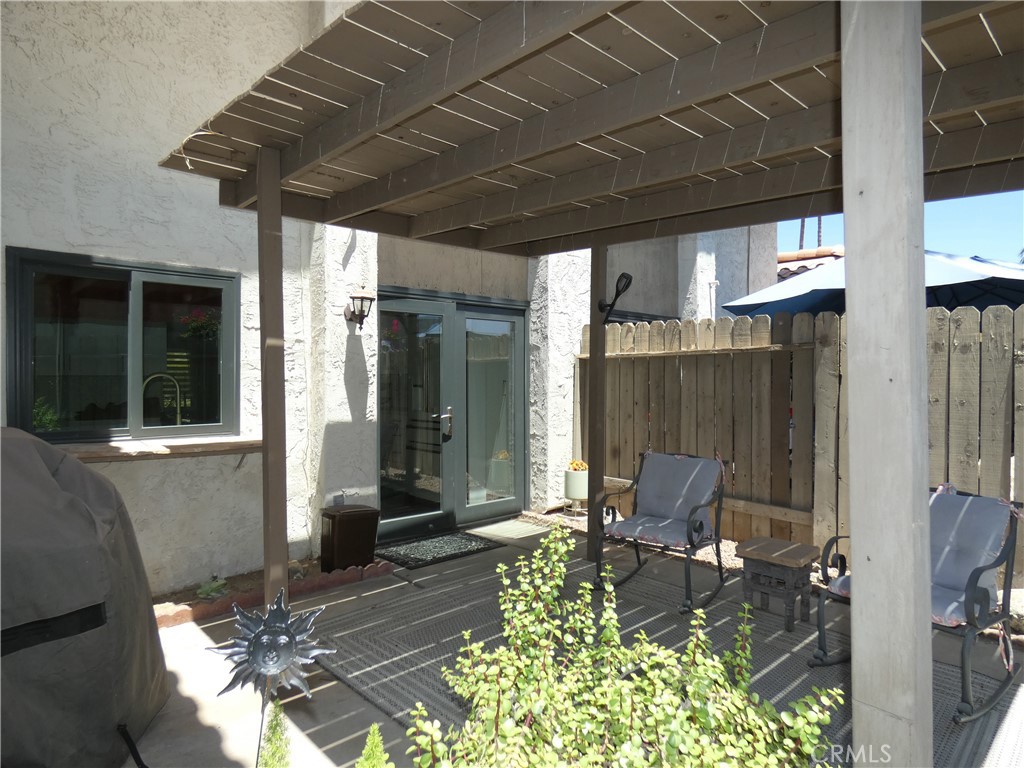 334 West Santa Elena Road Palm Springs, CA 92262 - Photo 26 of 45 a patio with table and chairs
