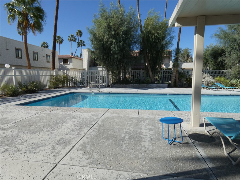 334 West Santa Elena Road Palm Springs, CA 92262 - Photo 29 of 45 a view of a swimming pool with a patio