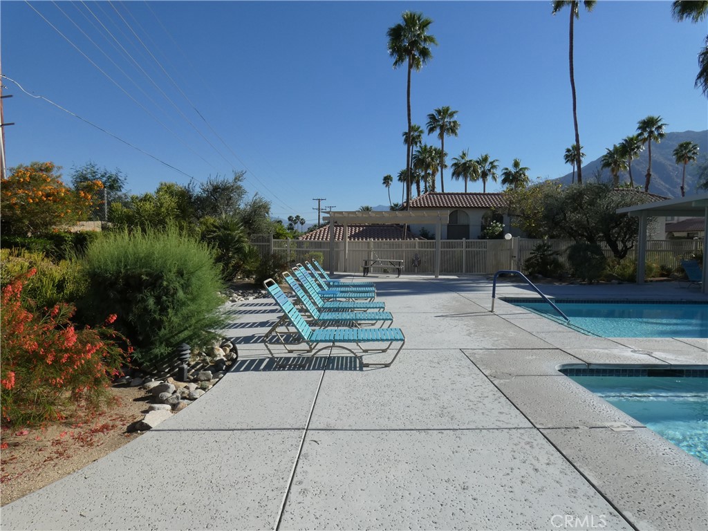 334 West Santa Elena Road Palm Springs, CA 92262 - Photo 39 of 45 a view of a terrace with a bench