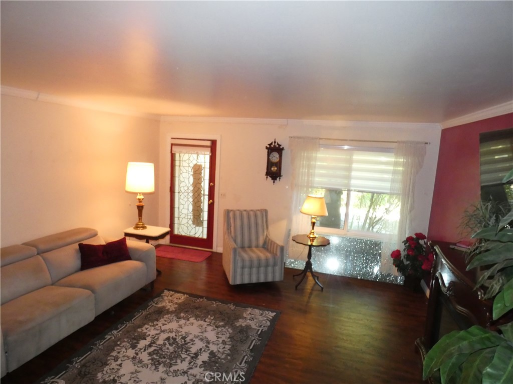 334 West Santa Elena Road Palm Springs, CA 92262 - Photo 9 of 45 a living room with furniture and a large window