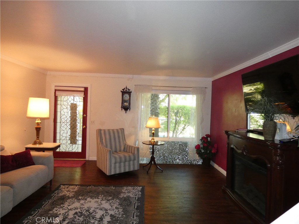 334 West Santa Elena Road Palm Springs, CA 92262 - Photo 10 of 45 a living room with furniture and a large window
