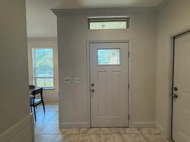 a kitchen with stainless steel appliances granite countertop a refrigerator stove microwave and cabinets