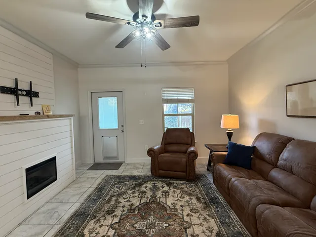 a living room with furniture and a couch